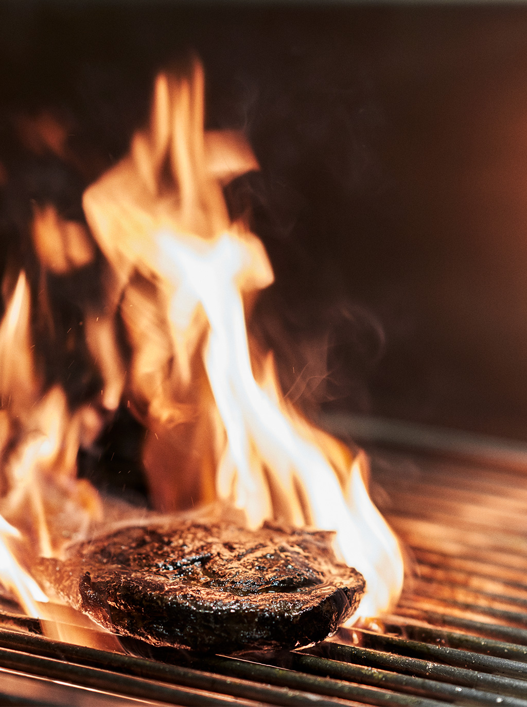 Flame grilled meat at The Grill