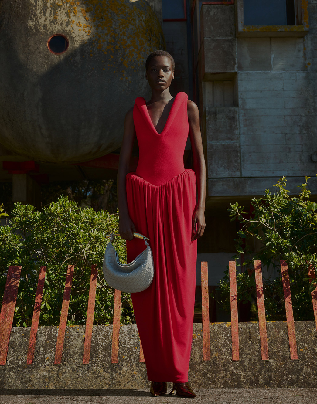 Model wearing a red dress