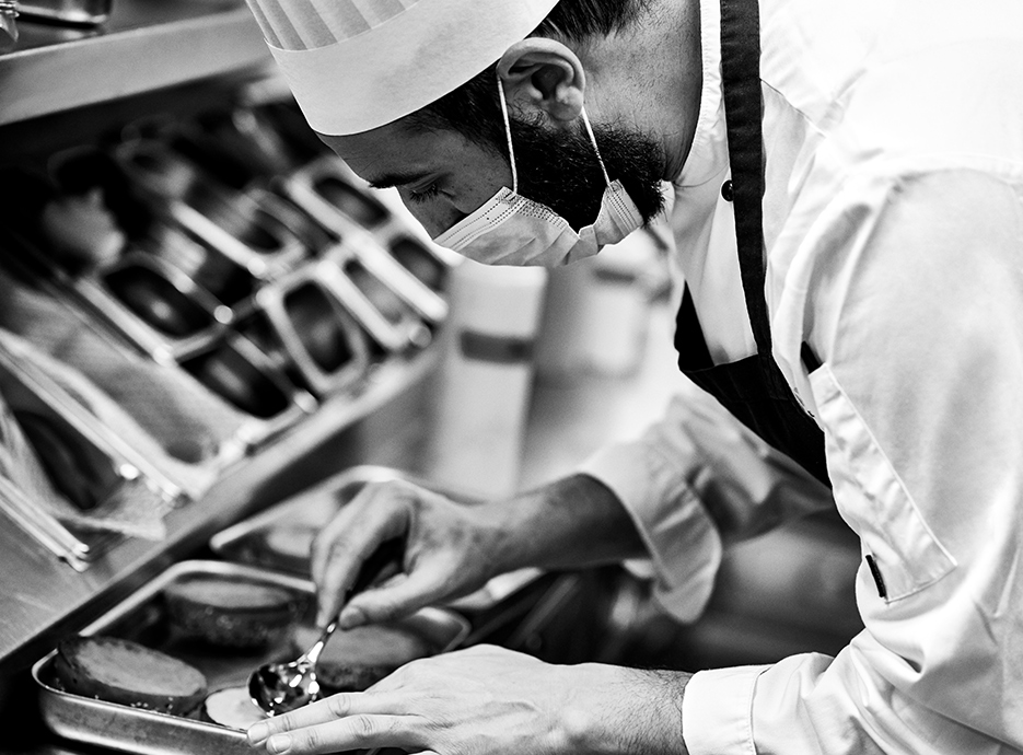 Chef prepping the burger