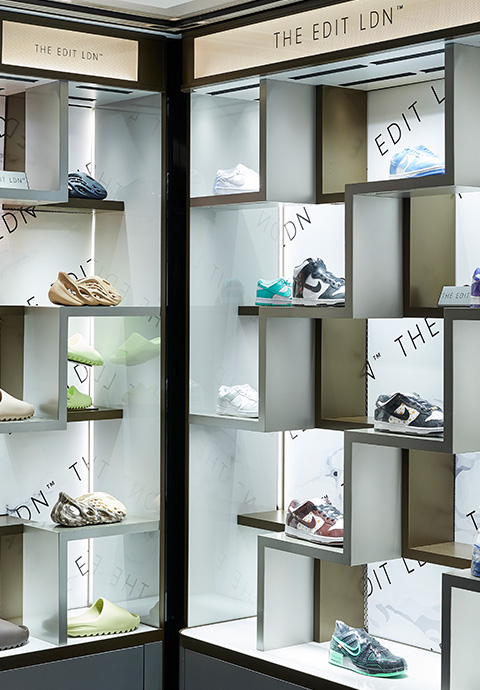 Wall of sneakers in The Edit LDN boutique in Harrods