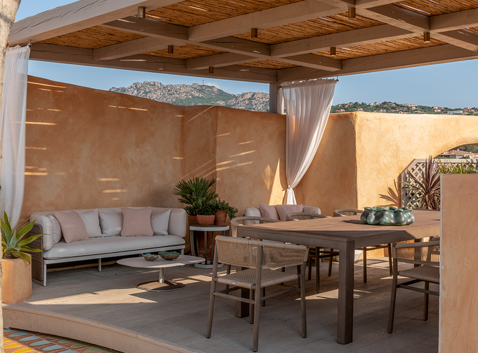 Outside seating area covered by a pergola