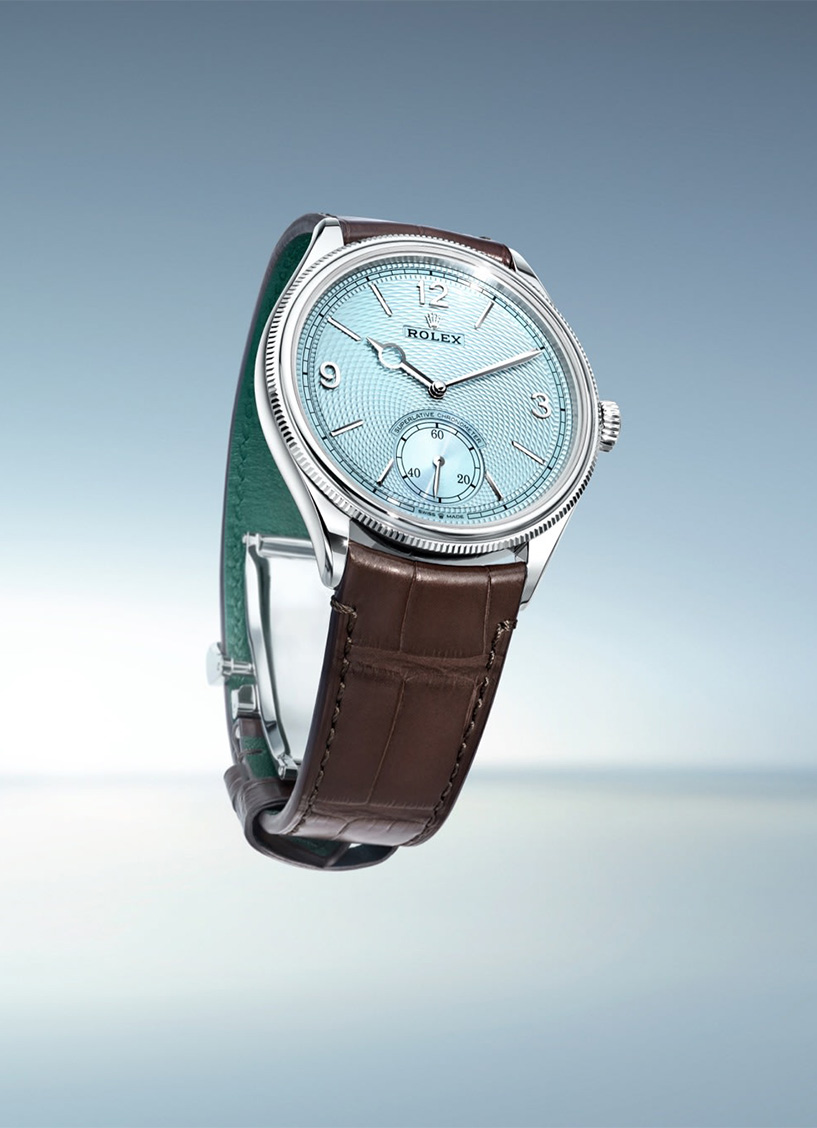 Rolex 1908 watch with brown leather strap an ice blue dial