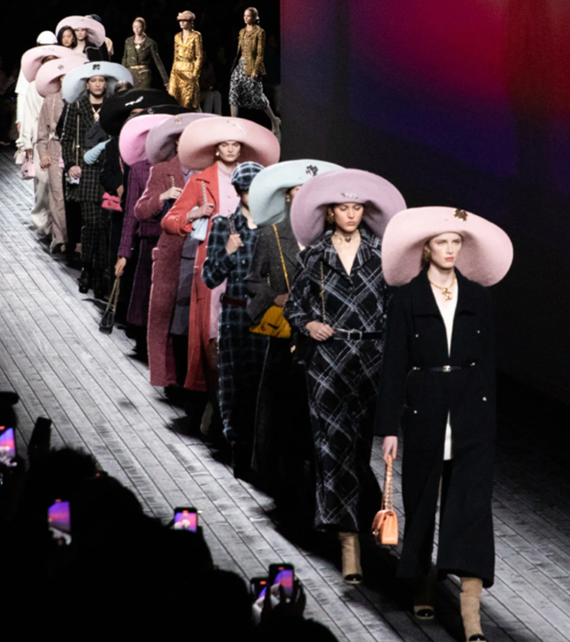 Female models walking down a runway