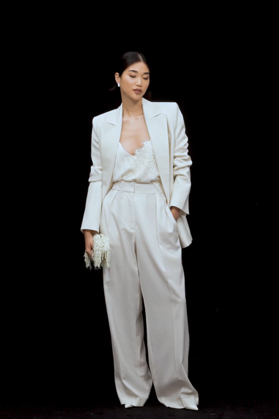 Woman wearing effortlessly casual white suit