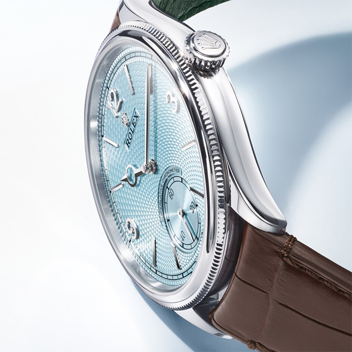 Rolex 1908 watch with brown leather strap an ice blue dial