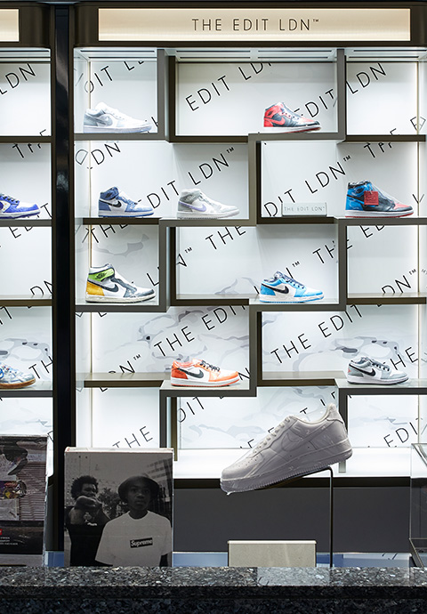 Wall of sneakers in The Edit LDN boutique in Harrods