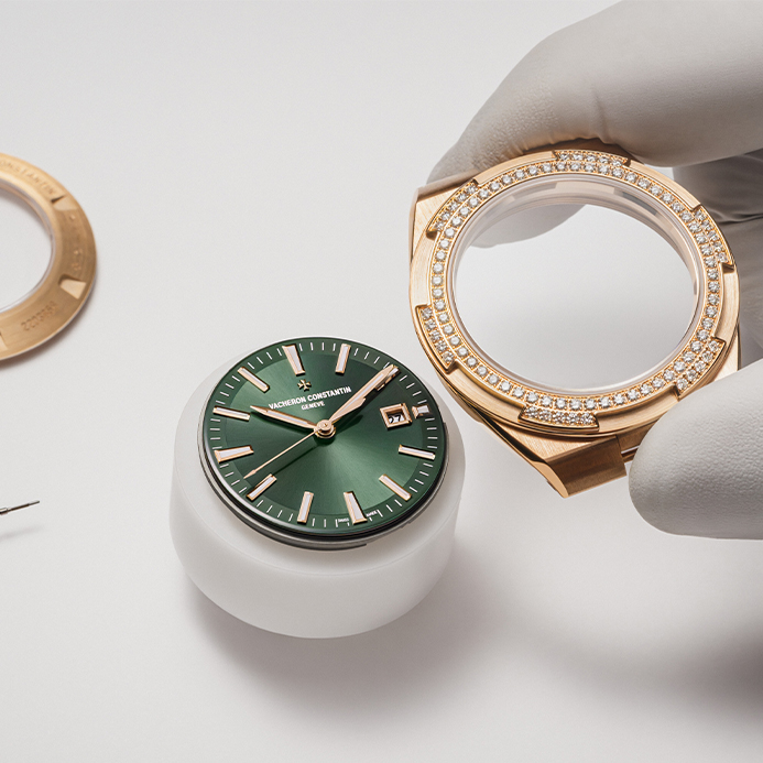 Watchmaking of the Vacheron Constantin Overseas with green sunburst dial