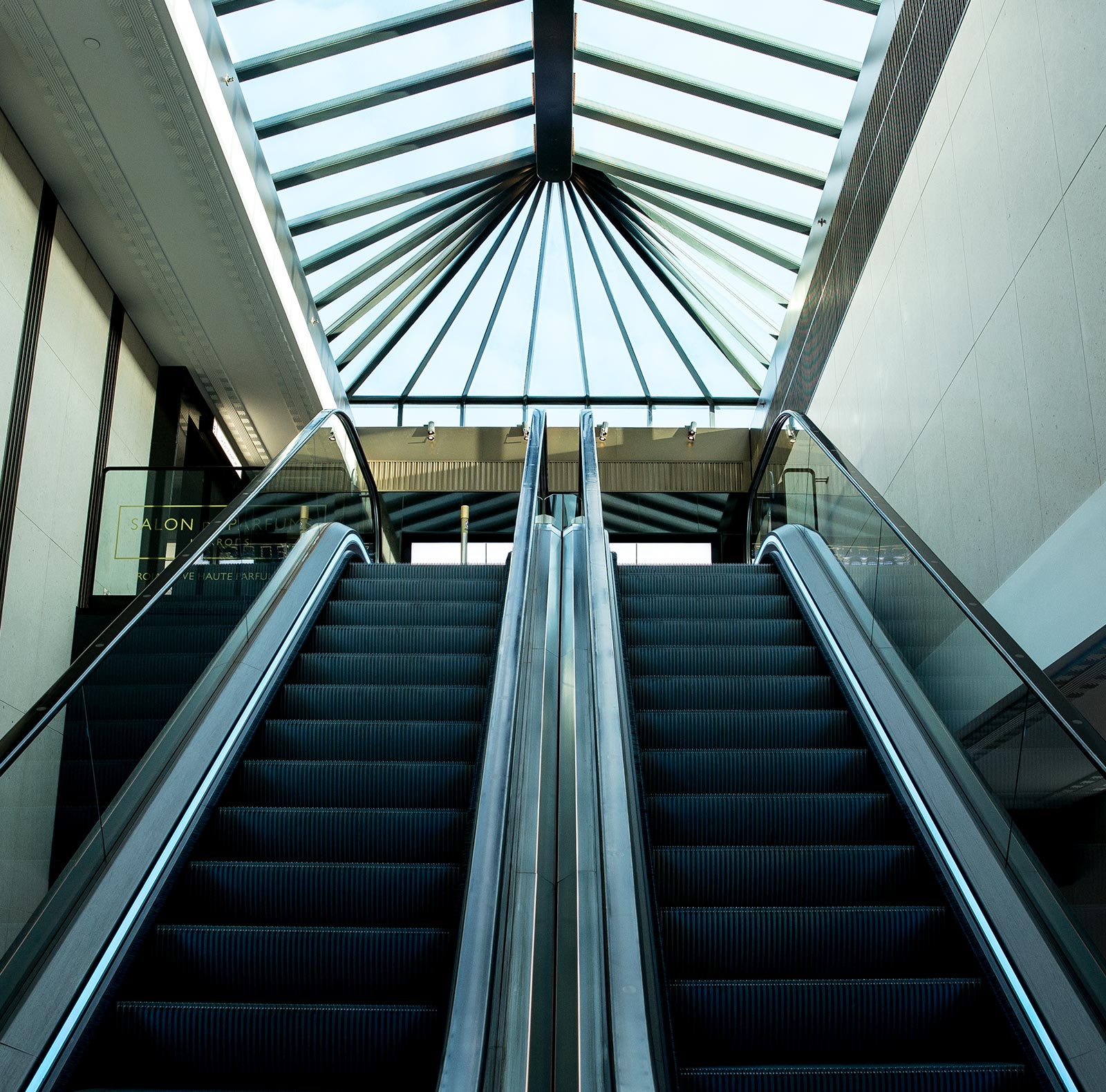 The escalators leading up to the Salon de Parfums