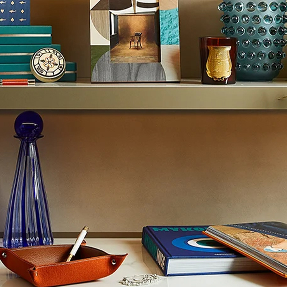 Blue vases and a leather tray