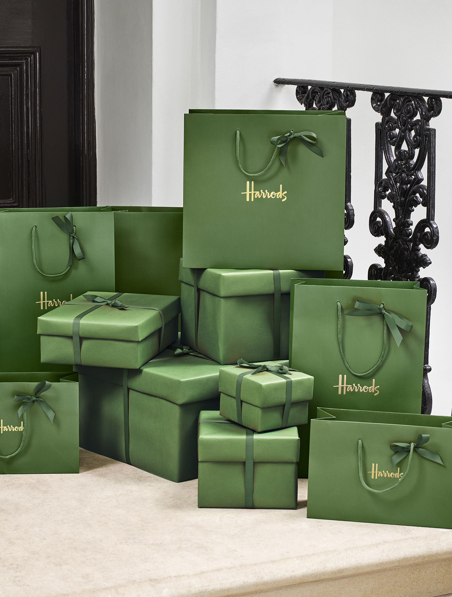 Harrods green shopping bag and gift boxes