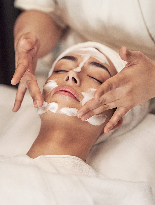 Woman getting a facial in the treatment rooms on the Lower Ground Floor Beauty Suites