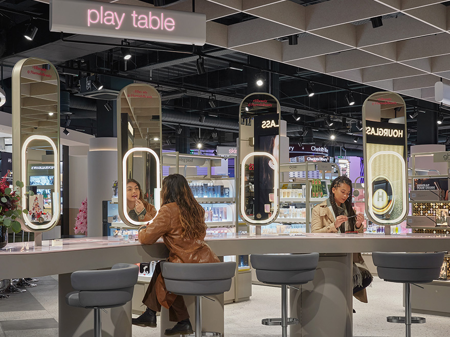 Customer sitting at The Playtable at H beauty Edinburgh