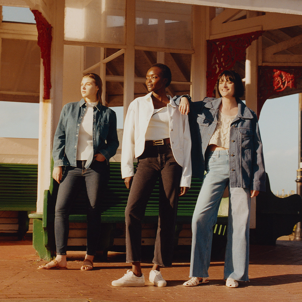 3 women wearing denim