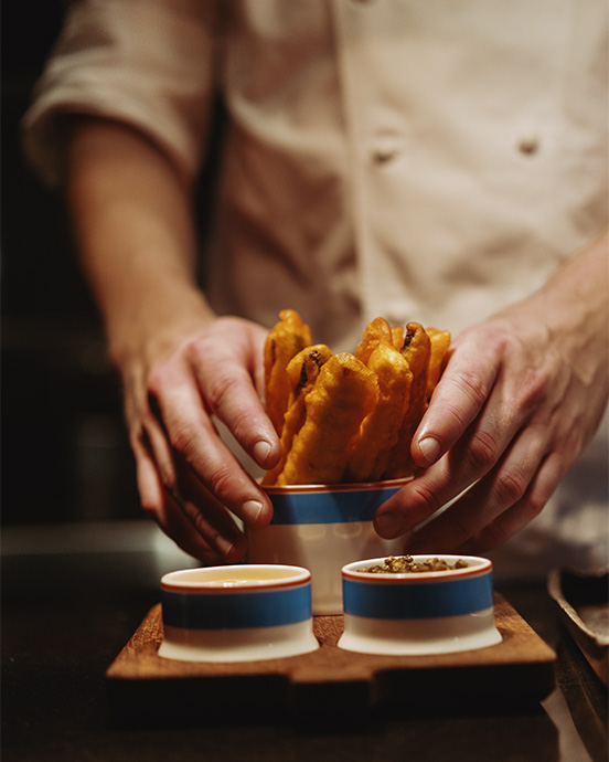 Bowl of chips with a side of caviar