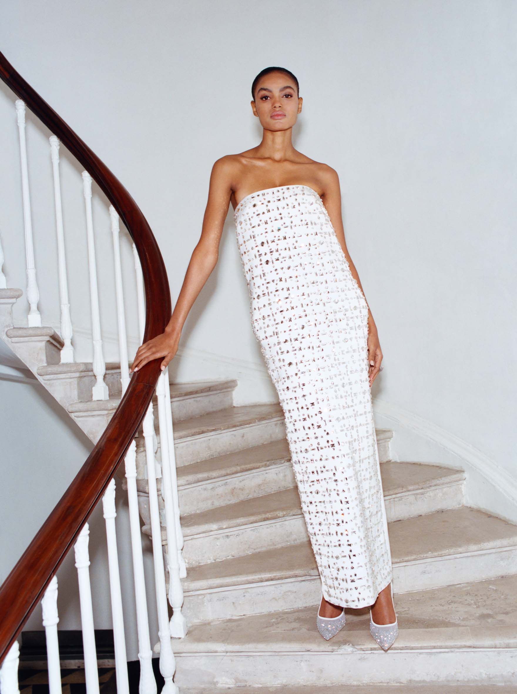 Woman wearing a white, strapless reception dress