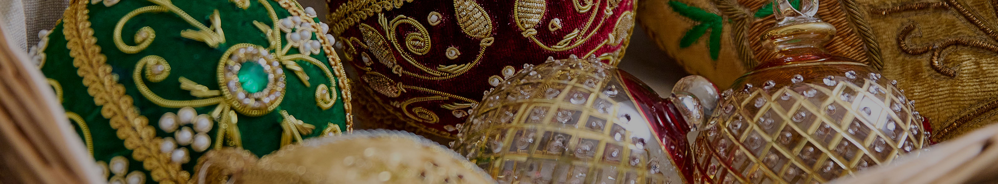 Basket of mixed glittery Christmas baubles