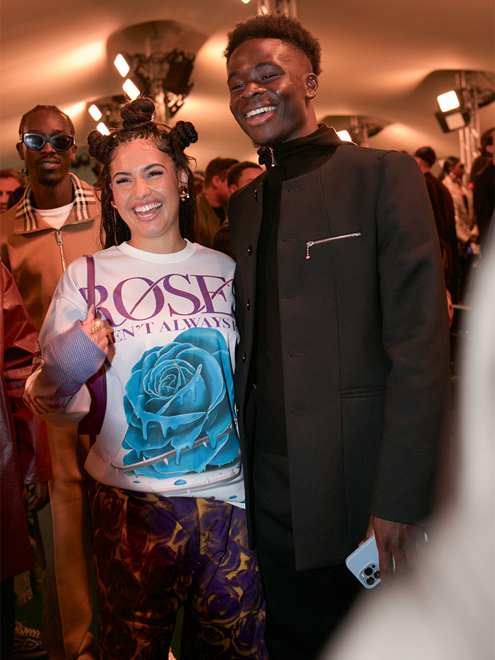 Singer-songwriter Mabel and Arsenal footballer Bukayo Saka attend the Burberry Spring/Summer 2024 runway at London Fashion Week