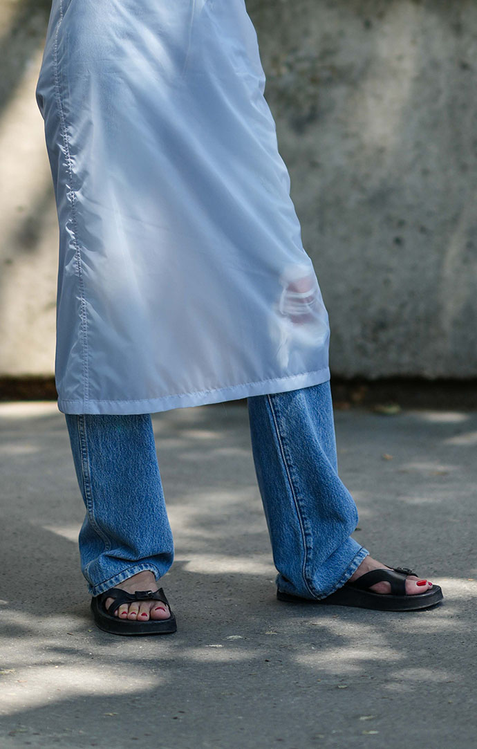 Carousel of street-style shots showing different styles of Sleek Sandal shoes