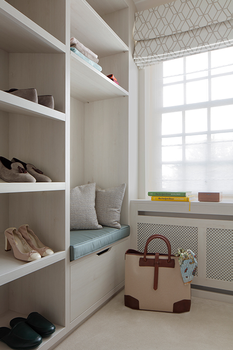 Dressing room with built in seat and bags and shoes