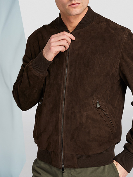 Male model wears brown suede bomber jacket