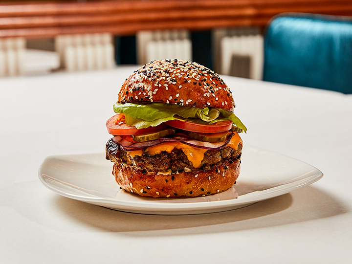 Burger on table in Gordon Ramsay Burger restaurant