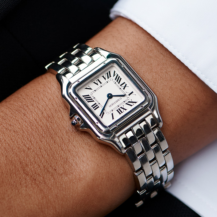 Close up of a silver Cartier watch